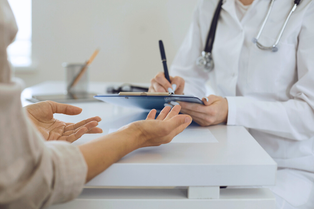 woman talking with doctor