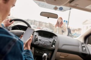 Distracted Driving I Causes of Pedestrian Accident